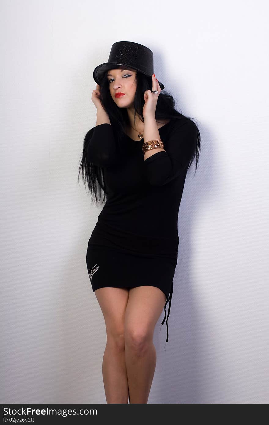 Beautiful sexy girl in black hat