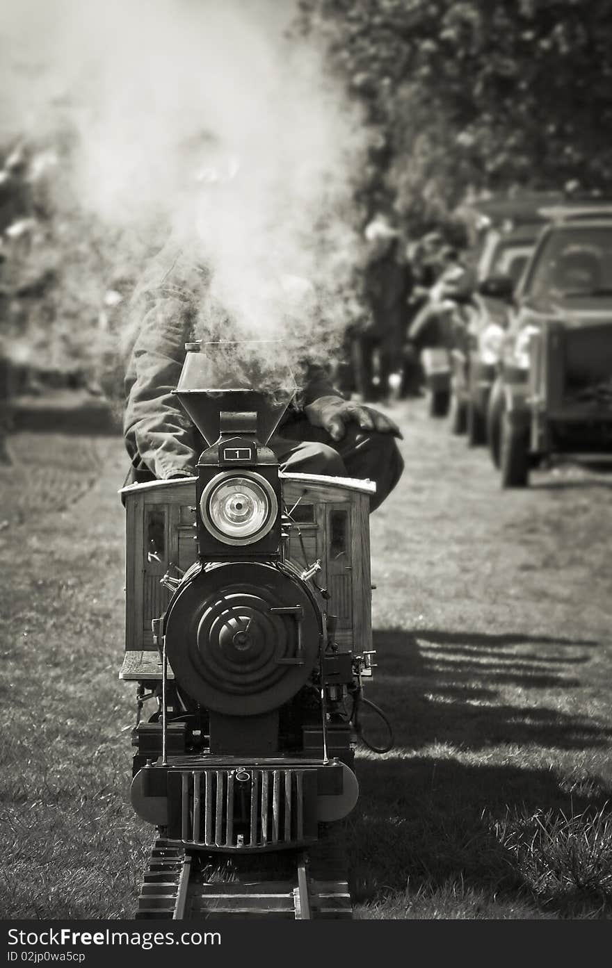 Full steam ahead for a vintage miniature train. Full steam ahead for a vintage miniature train