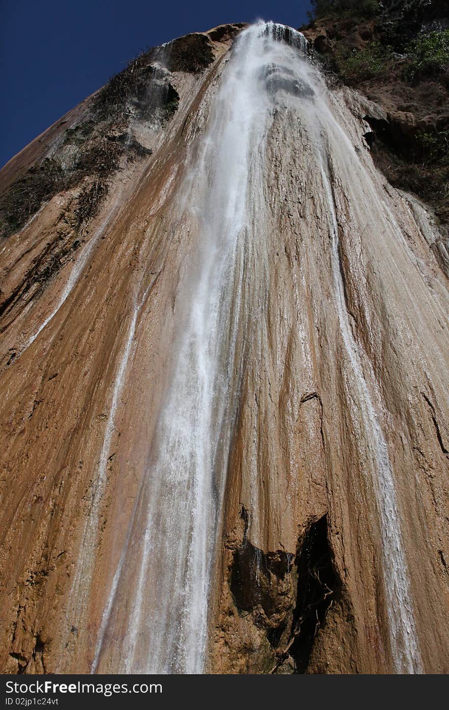 Waterfall from high mountain in Marocco in sunshine