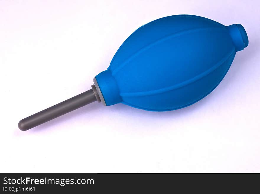 Blue rubber air ball pump on white background.