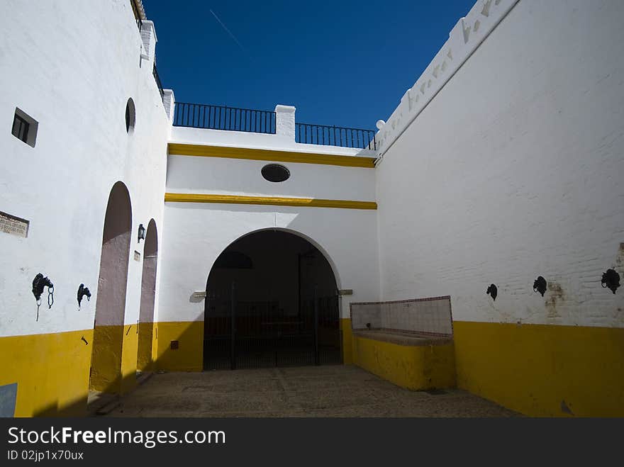 La Maestranza, white and yellow colors of the wall, makes the tones of the spanish flag. La Maestranza, white and yellow colors of the wall, makes the tones of the spanish flag