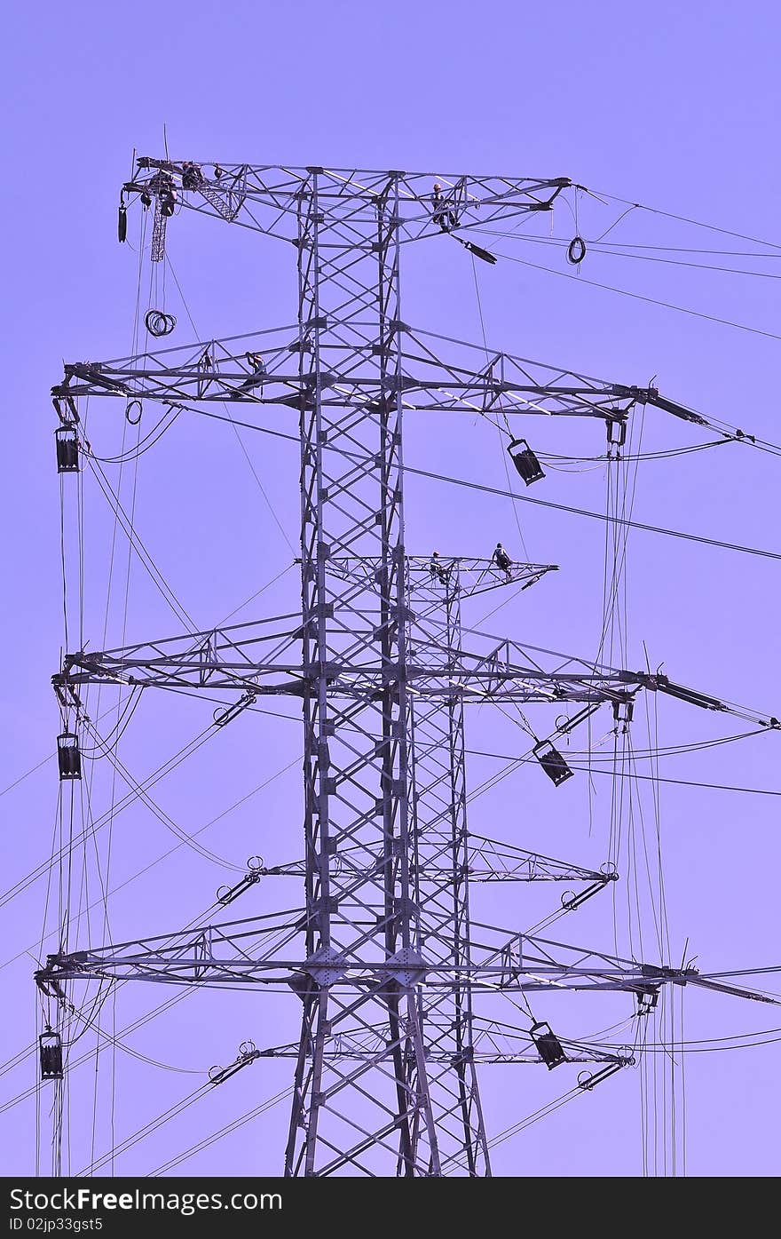 Workers Of High Voltage Posts