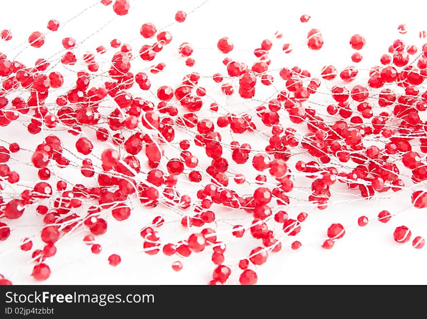 A chain  with red jewels isolated on white. A chain  with red jewels isolated on white