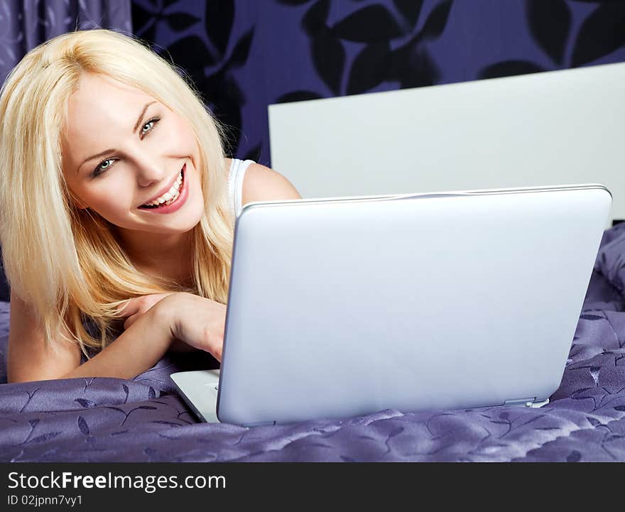 Woman Bed Laptop Laughing