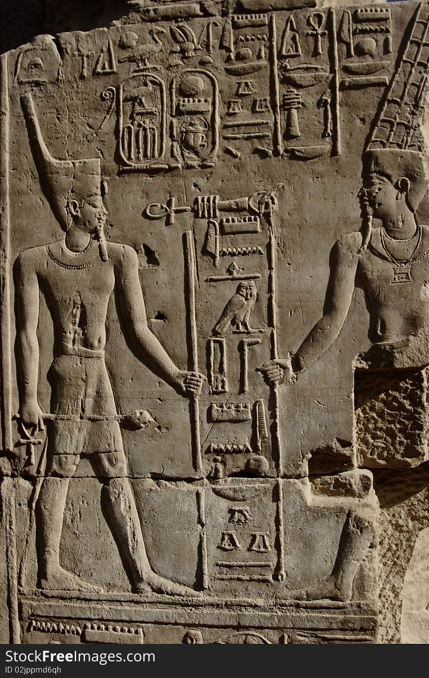 A detail of a hieroglyph in Karnak temple, Egypt. A detail of a hieroglyph in Karnak temple, Egypt.