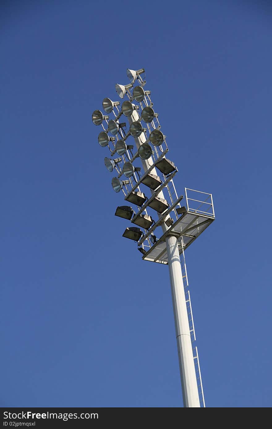 Closeup on the lights above a soccer stadium. Closeup on the lights above a soccer stadium