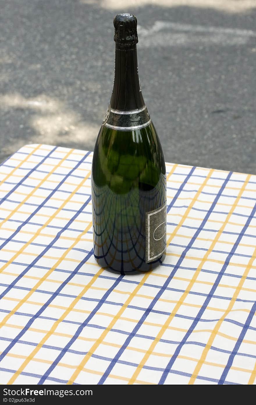 Bottle of champagne on a table