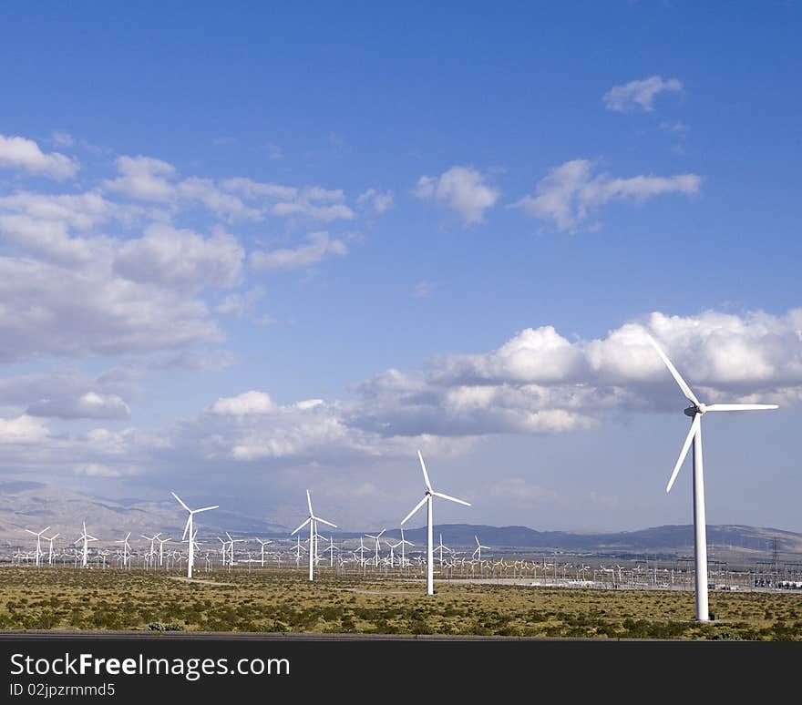 Windmills outside of Palm Springs, CA on a beautiful cloudy day. Windmills outside of Palm Springs, CA on a beautiful cloudy day