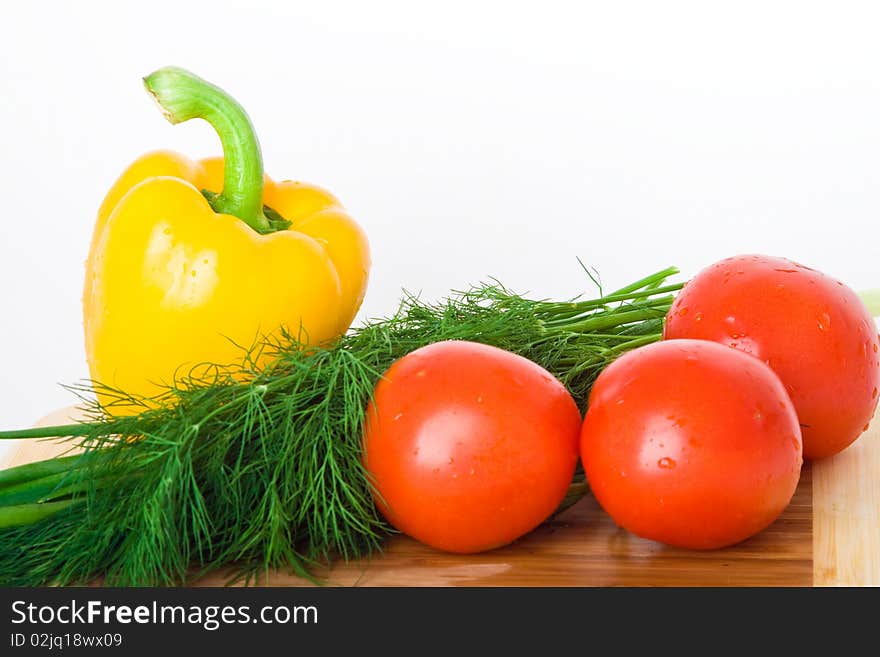 Fresh vegetables on wood plate