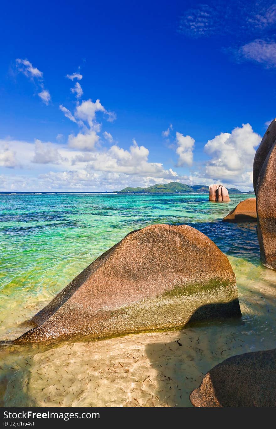 Stones on tropical beach at Seychelles - nature background