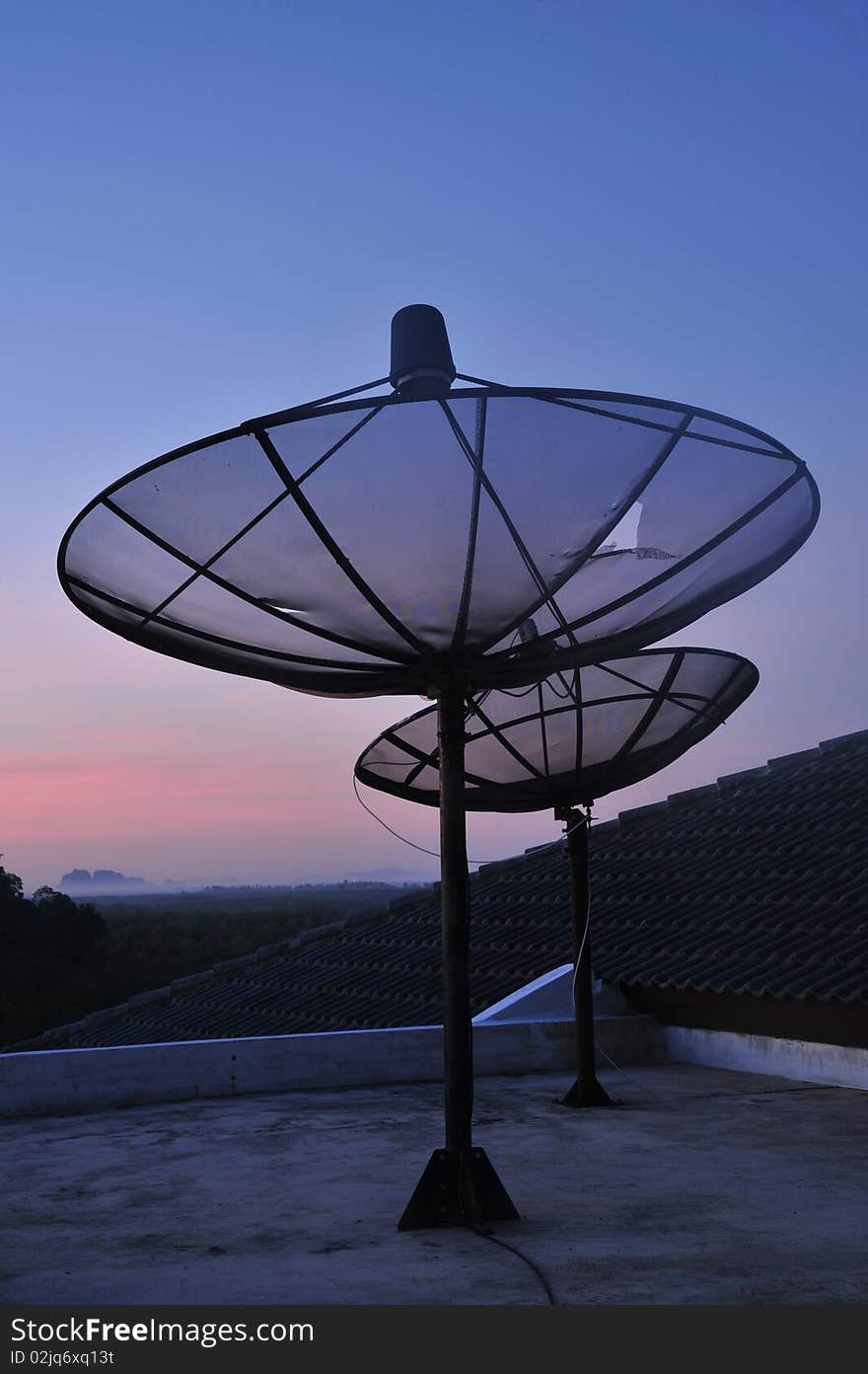 Satellite dish with a sky blue background. Satellite dish with a sky blue background.