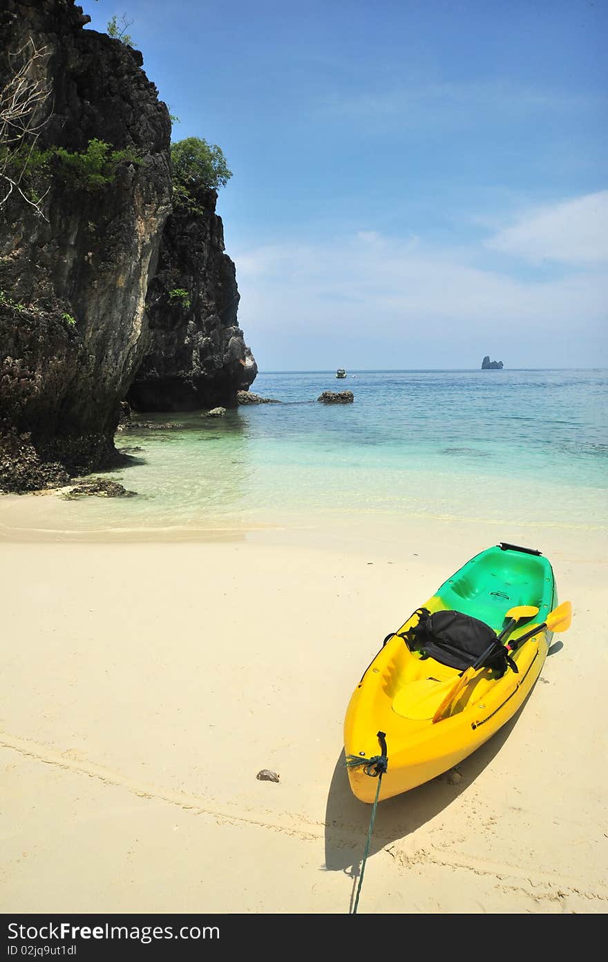 Kayaks on the tropical beach, ,Hong bay,Hong Island.krabi, South of Thailand. Kayaks on the tropical beach, ,Hong bay,Hong Island.krabi, South of Thailand