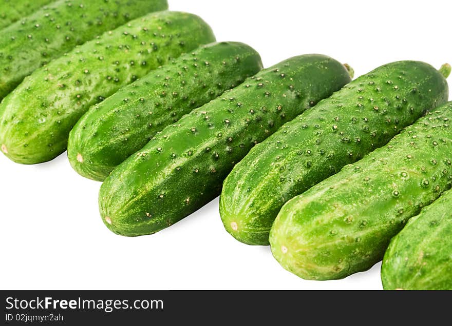 Fresh cucumbers isolated on white background