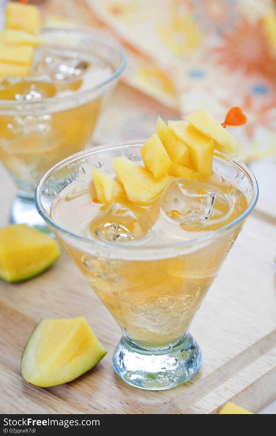 Cocktail of mango with pieces of the fruit. Cocktail of mango with pieces of the fruit