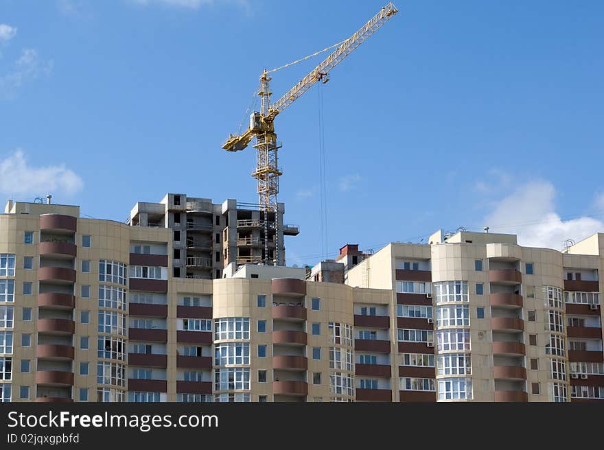 New building against the background of the blue sky