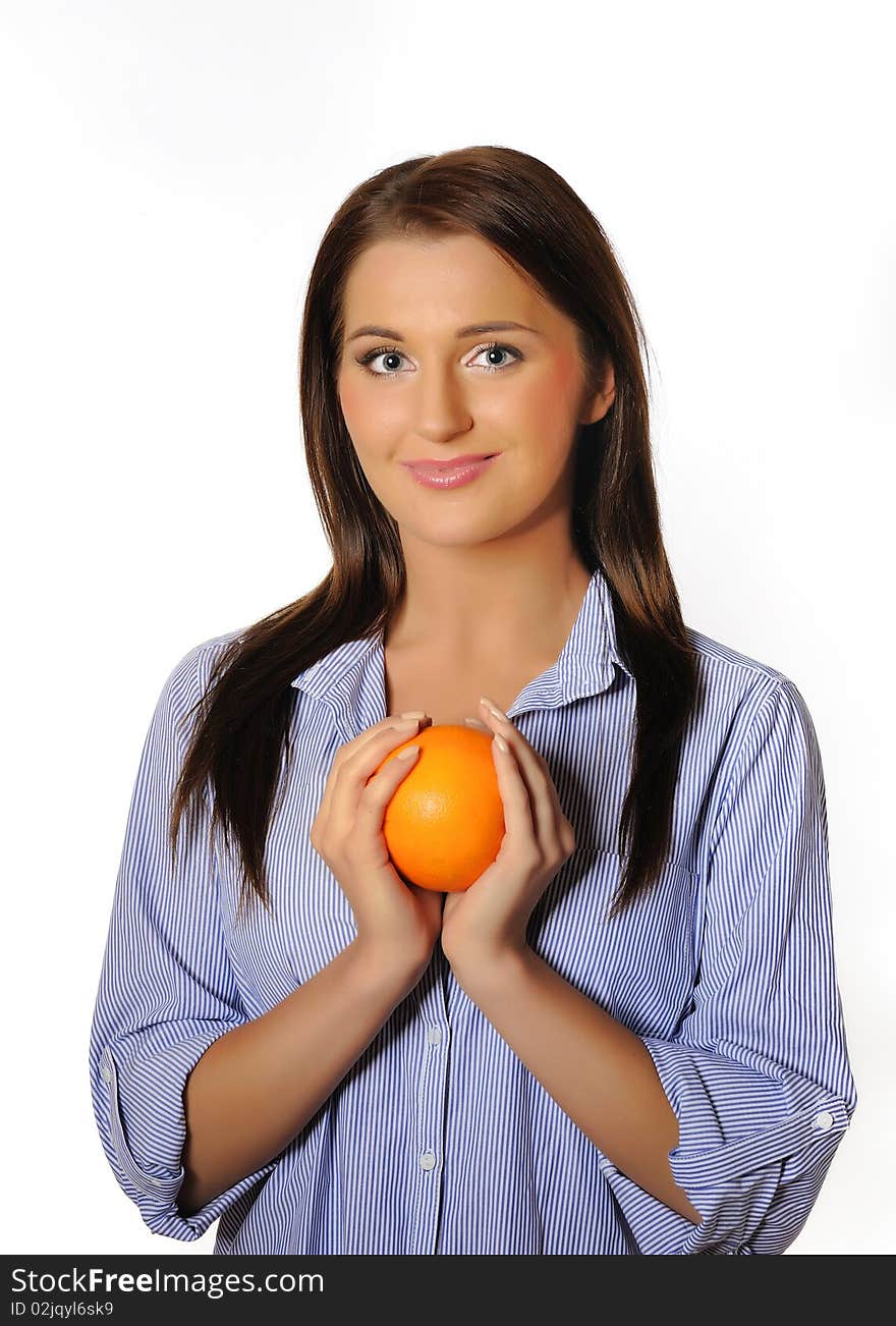 Young beautiful woman with citrus orange fruit