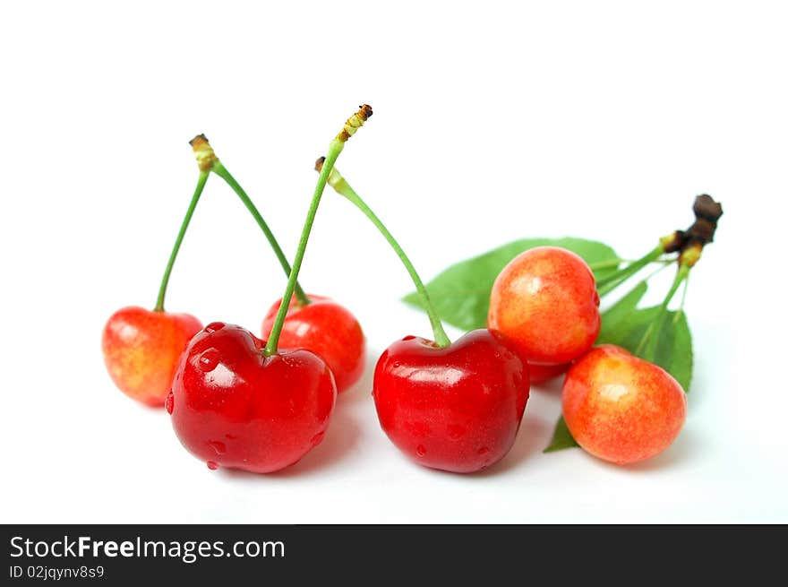 Fresh cherry fruits isolated on a white background