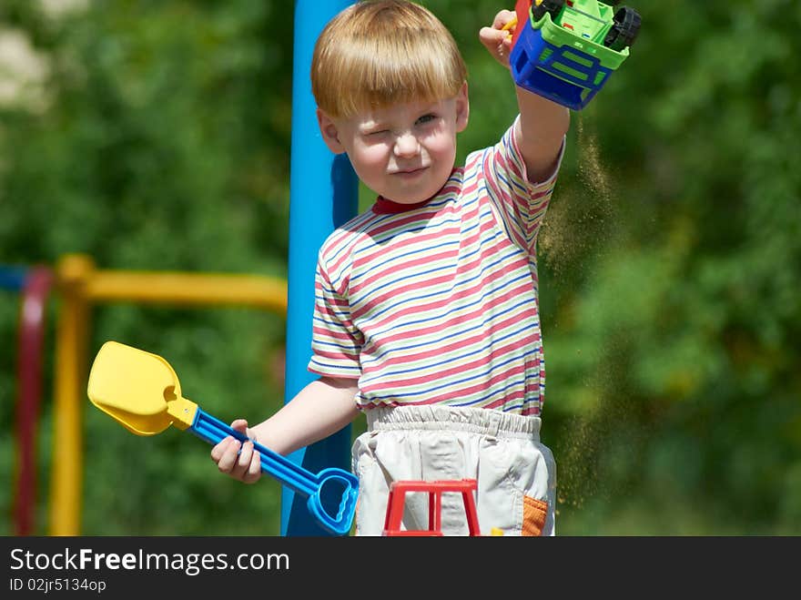 The little boy on walk in the summer. The little boy on walk in the summer