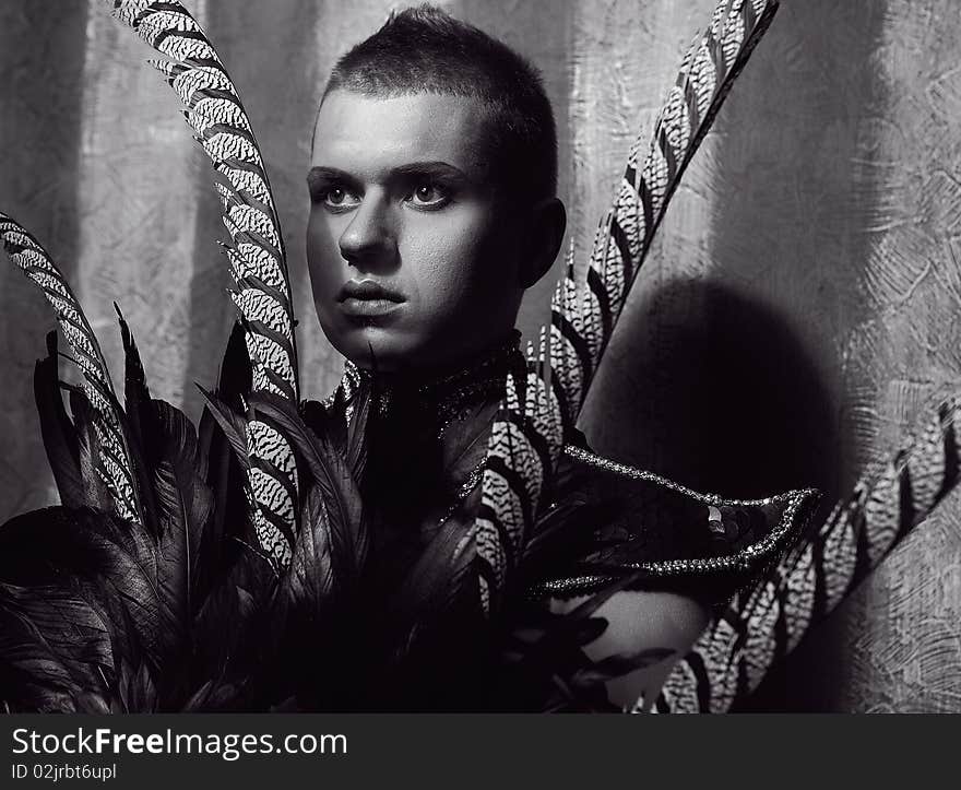 Expressive Portrait of attractive man with concentrated and gloomy face. Photo.