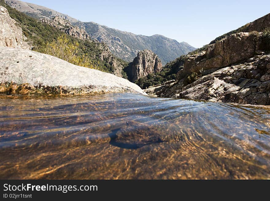 Water flowing on a rocky mountain. Water flowing on a rocky mountain