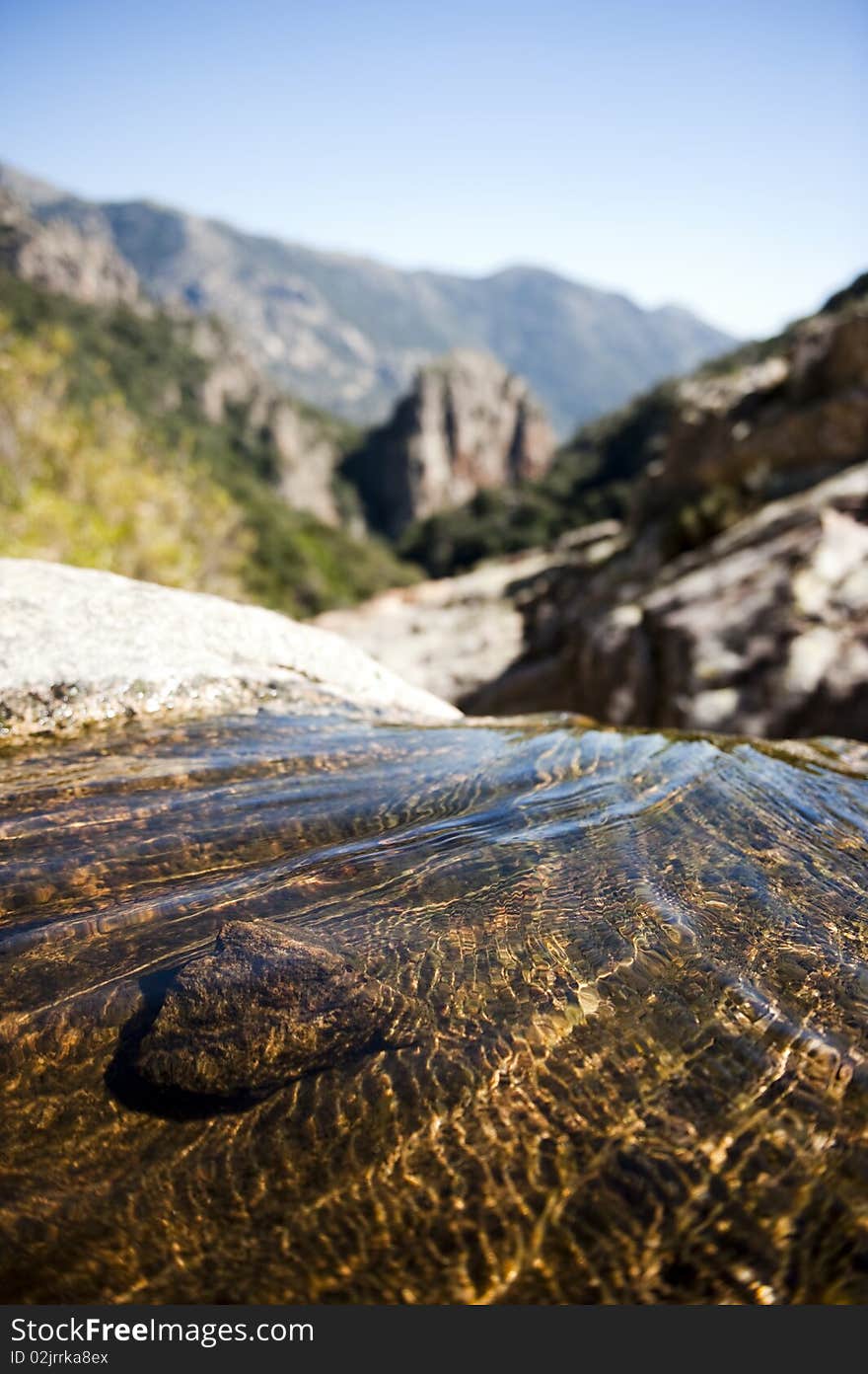 Water flowing on a rocky mountain. Water flowing on a rocky mountain