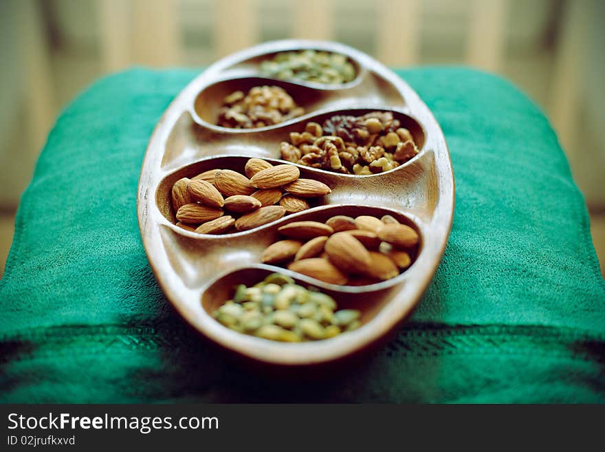 Nuts In Wooden Dish