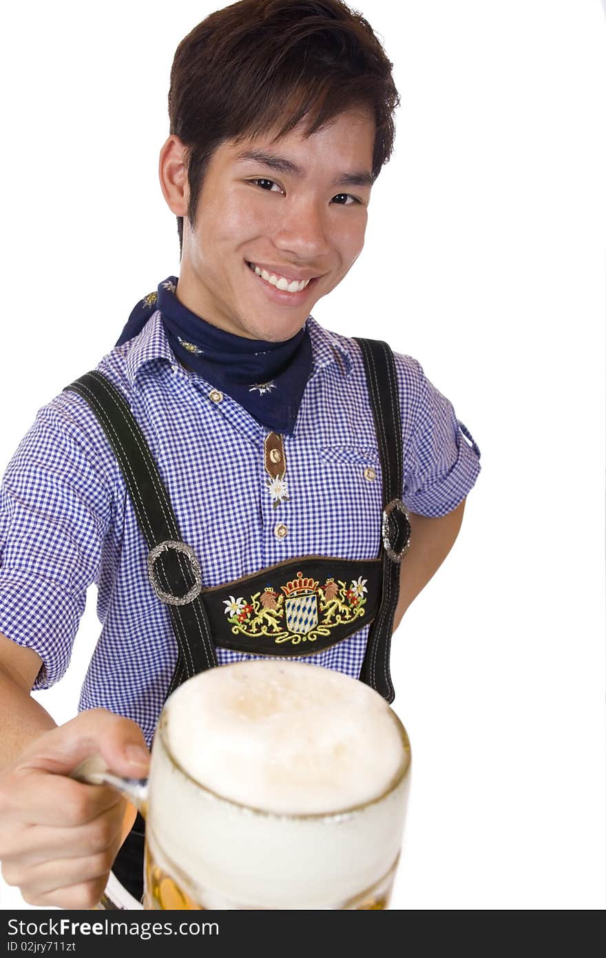 Happy Asian man holds Oktoberfest beer stein