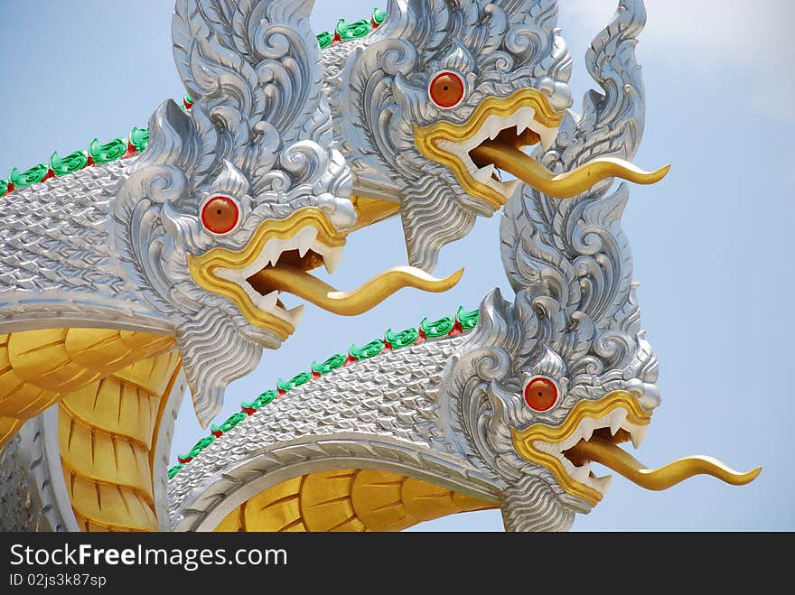 Three white  Nagas  at  temple in Thailand.