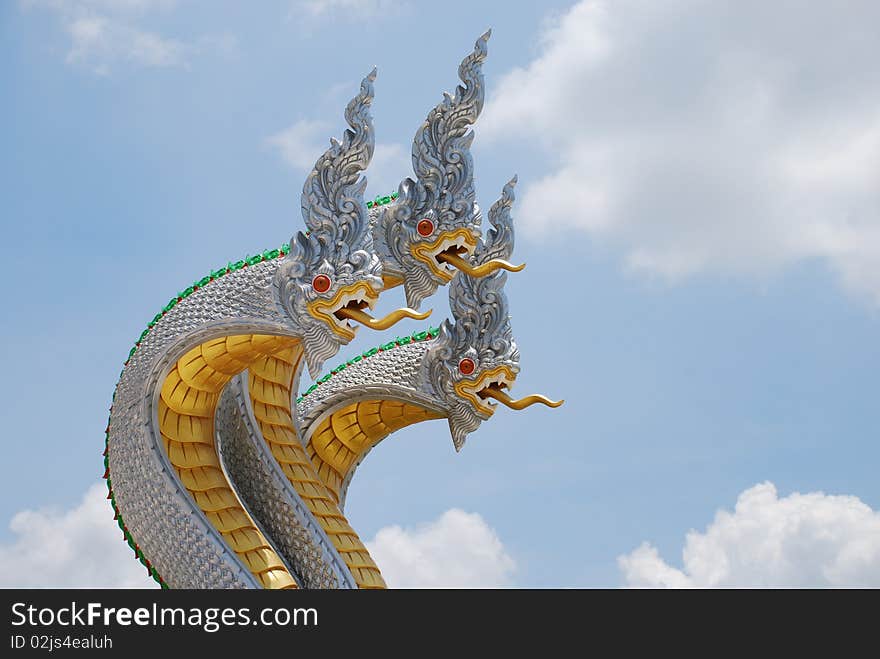 Three white Nagas at temple in Thailand.