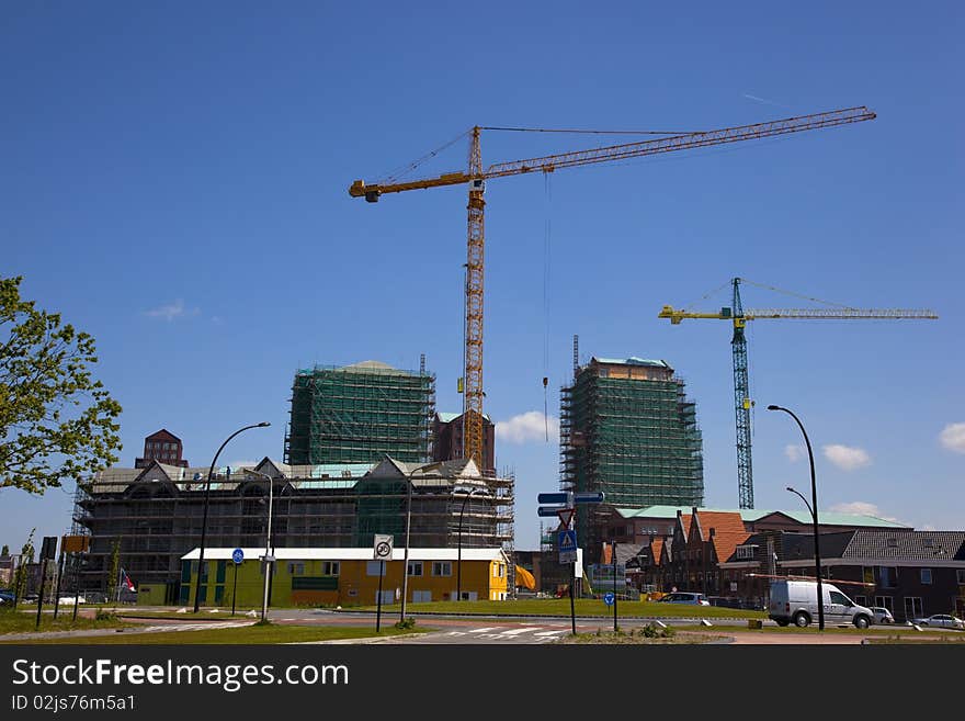 A construction site with bulding cranes