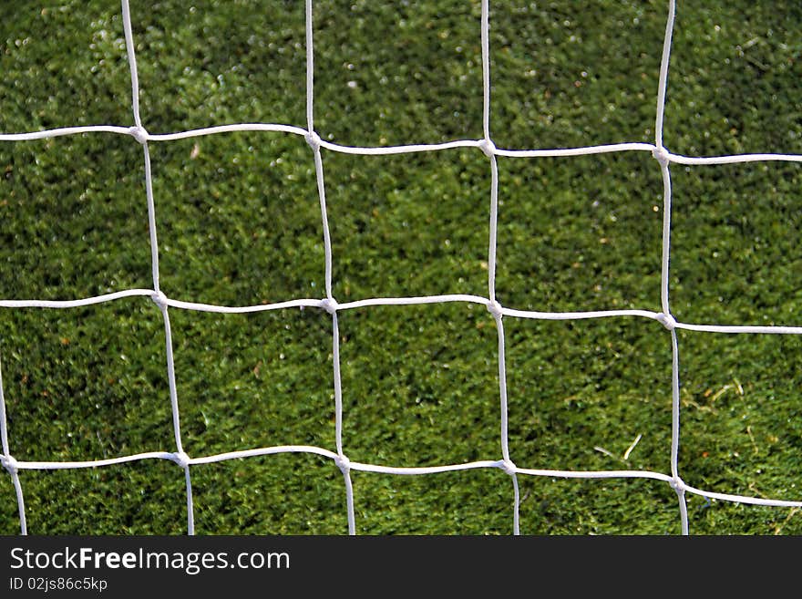 Closeup on the white soccer goal net