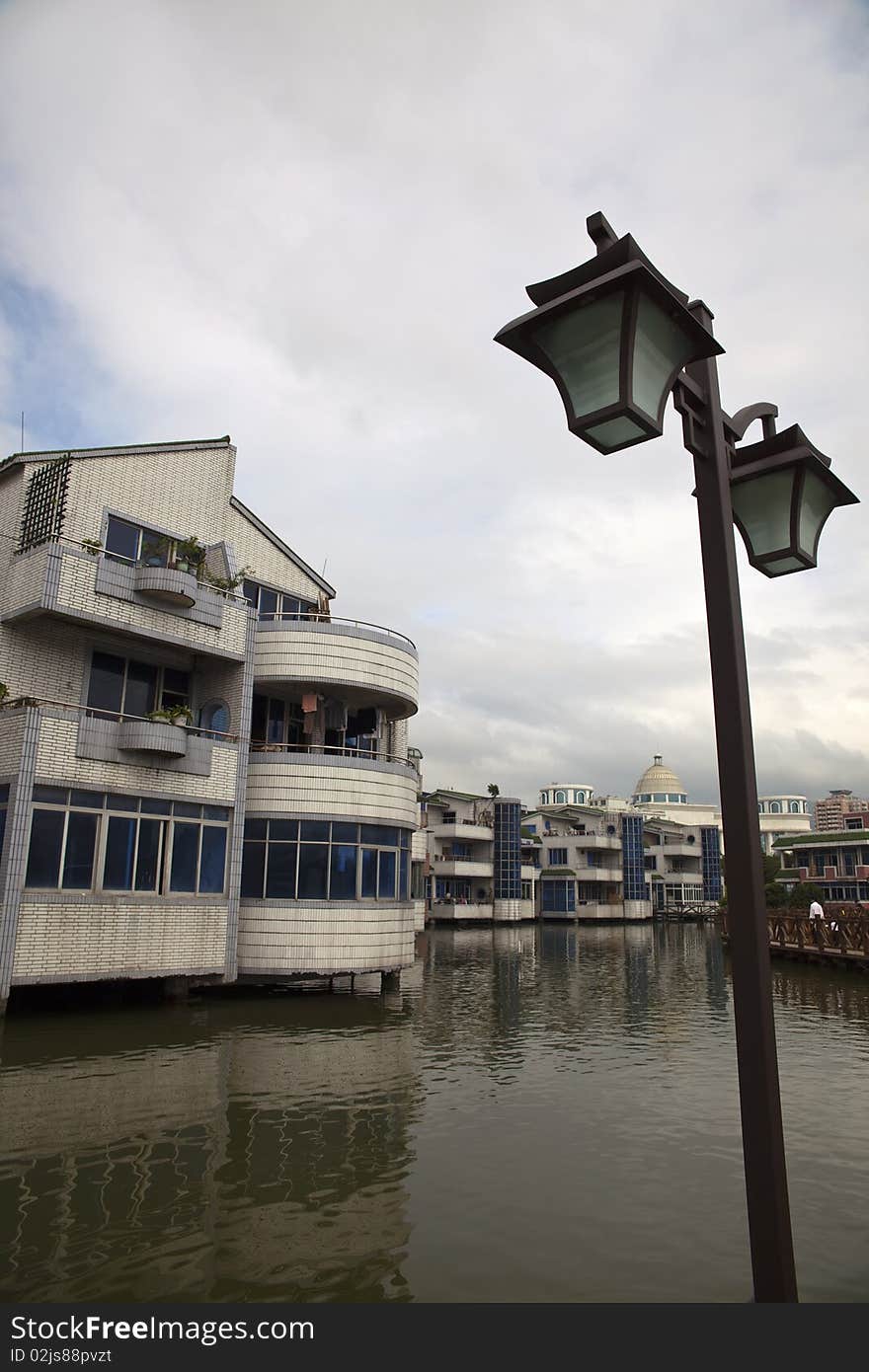 Lamps And Houses On Water