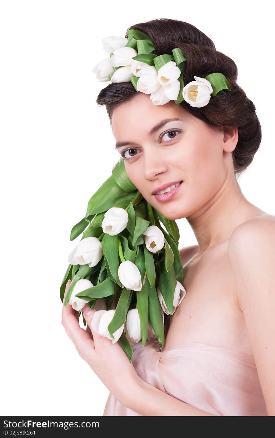 Pretty young woman with spring tulips. Pretty young woman with spring tulips