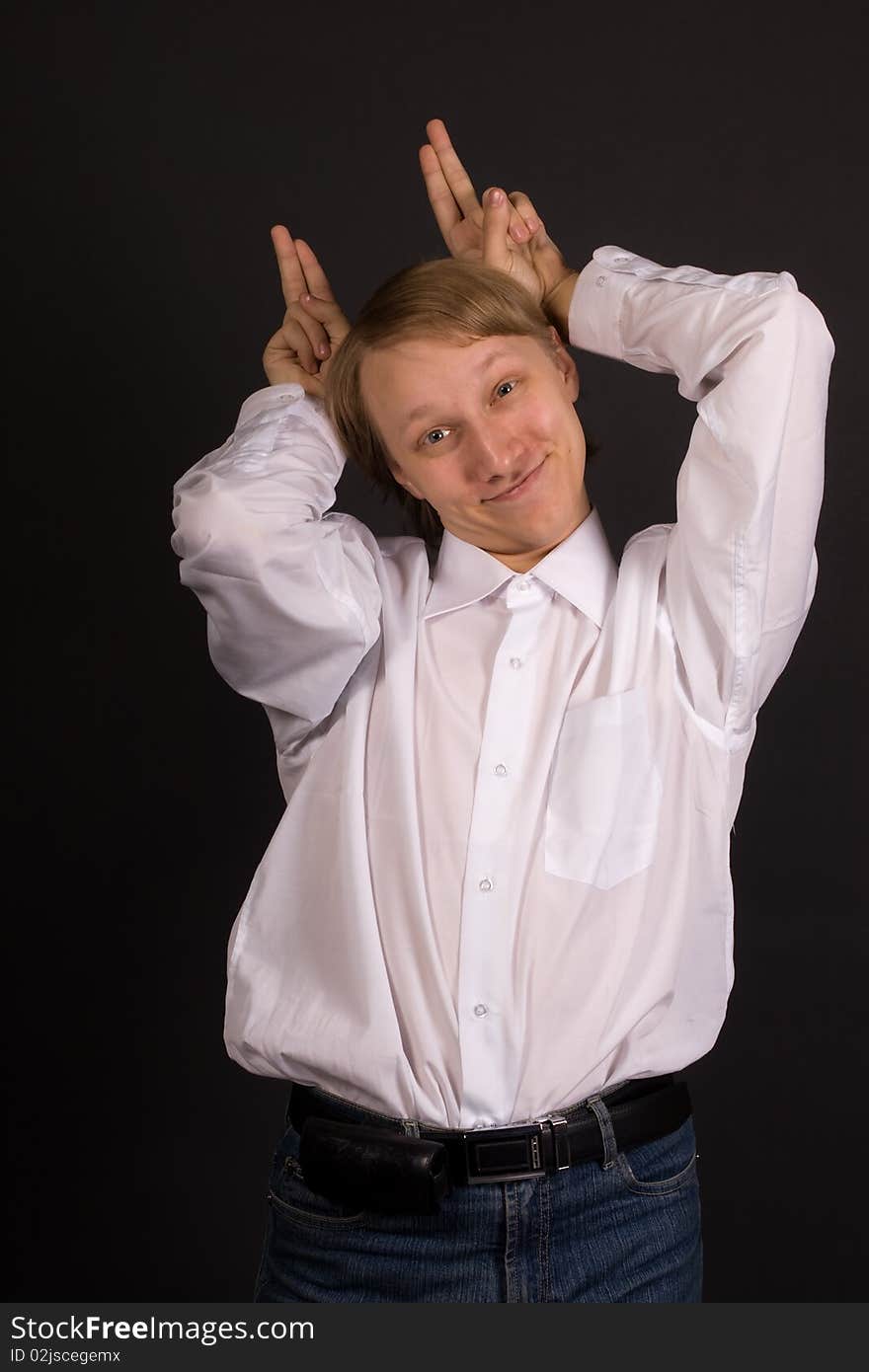 A portrait of a young smiling boy. A portrait of a young smiling boy