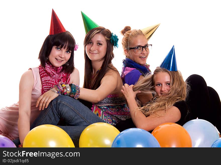 Happy girls having fun in studio on birthday