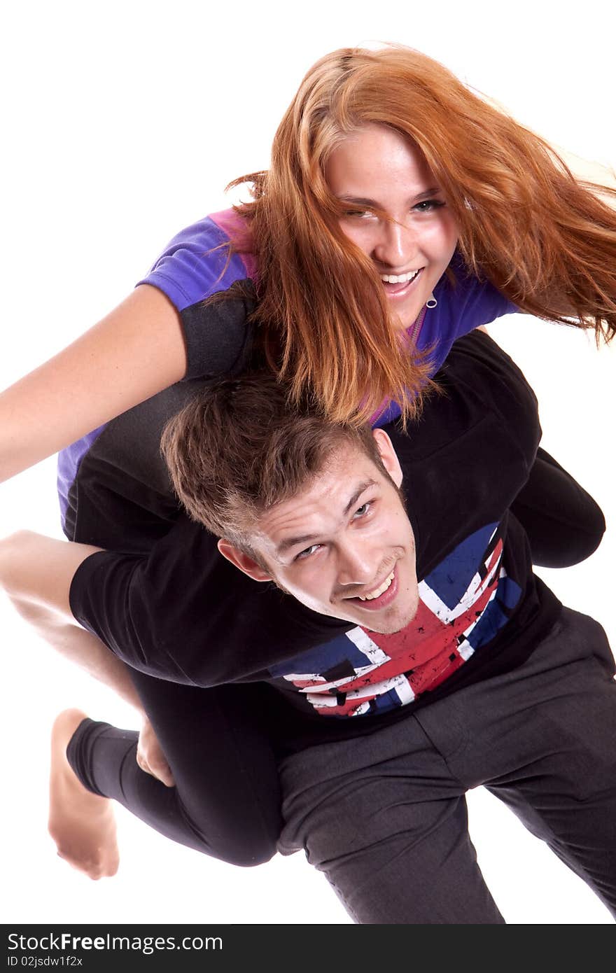 Boy and his girlfriend shot in studio on white background