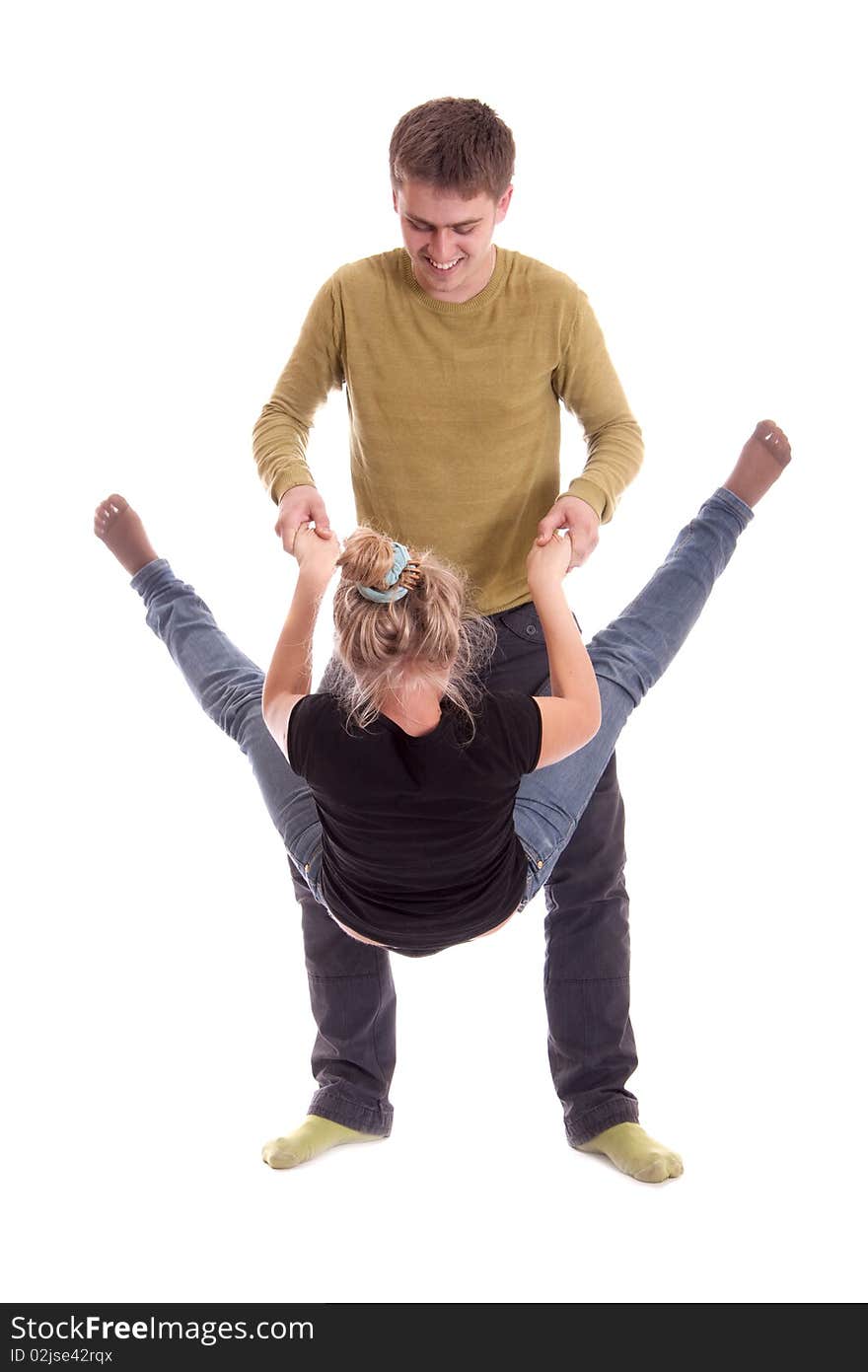 Shot in studio on white background, boy and girl have fun