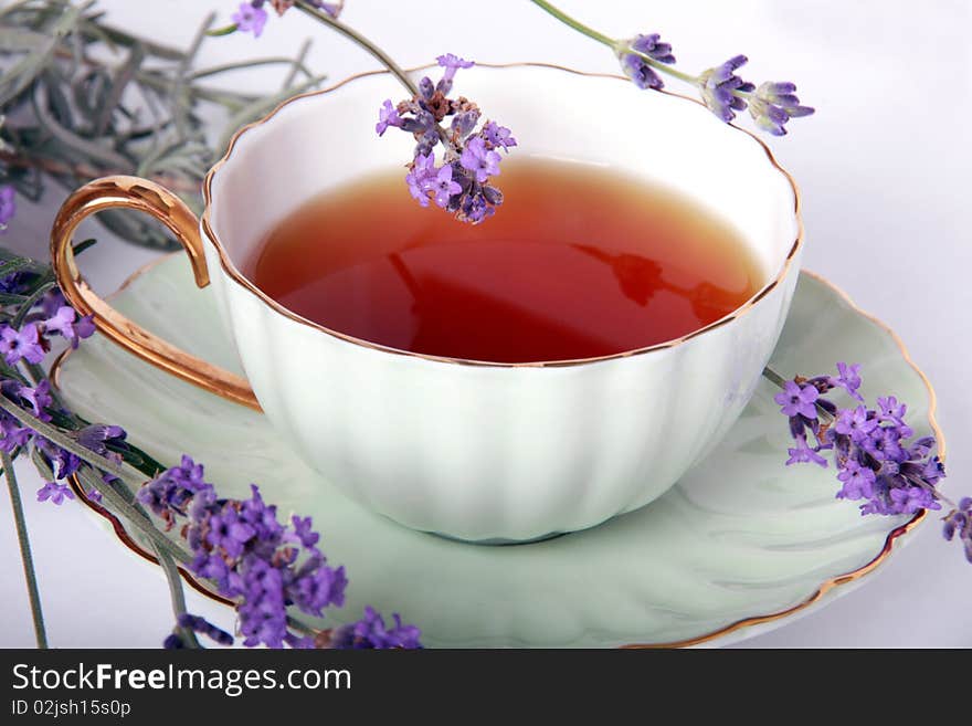 A Cup of tea and flowers of the lavender