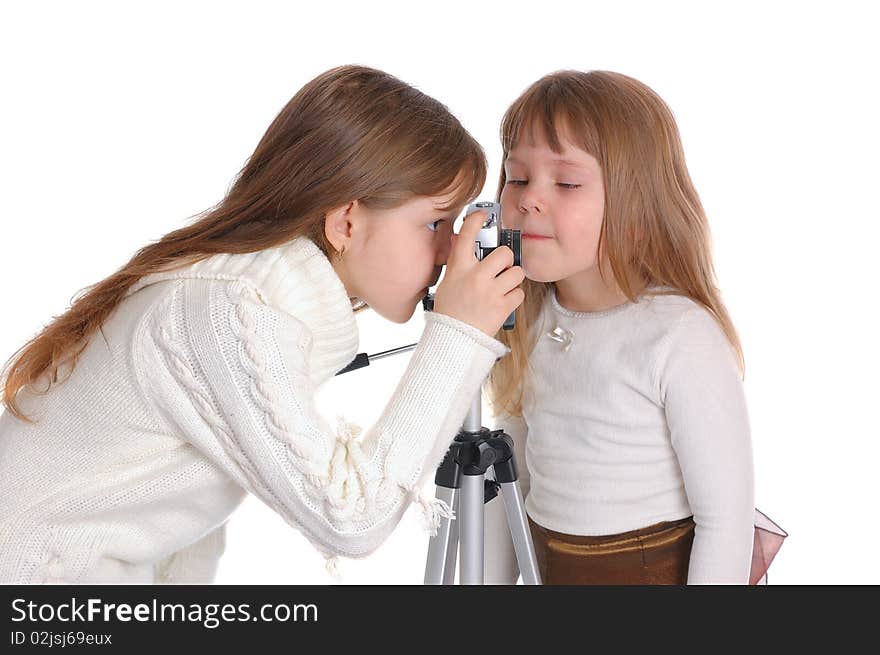 Girls with the camera on a white