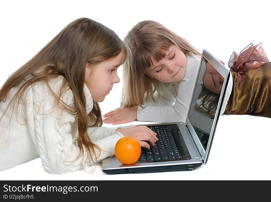 Girls with the laptop on a white