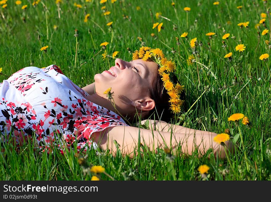 Beautiful Girl Lying Down Of Grass