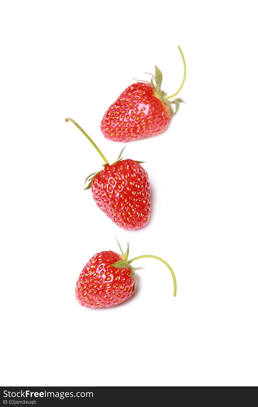 Three strawberry isolated on white background