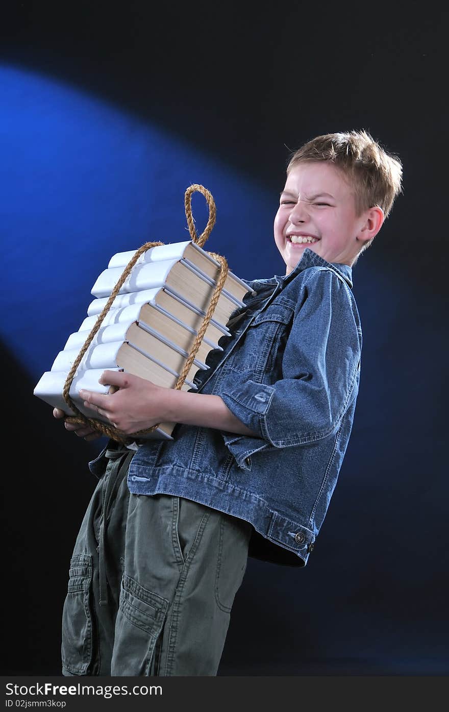 Boy and heavy books