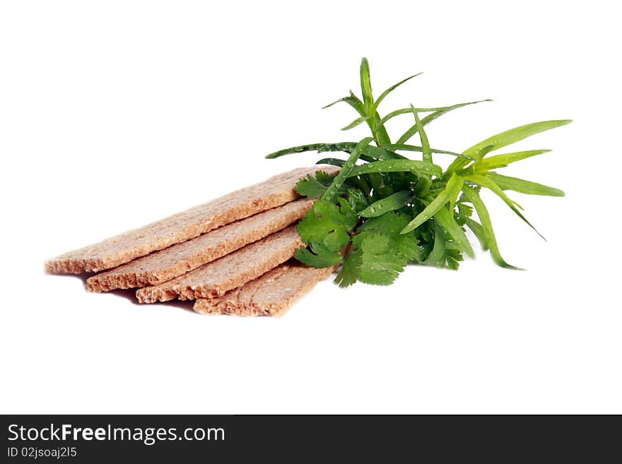 Crispbread with estragon isolated on a white background