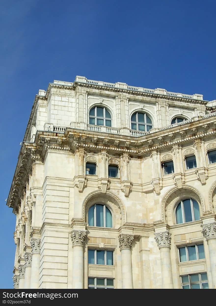 Architecture from the second large building in the world, Parliament Palace in Romania on blue sky