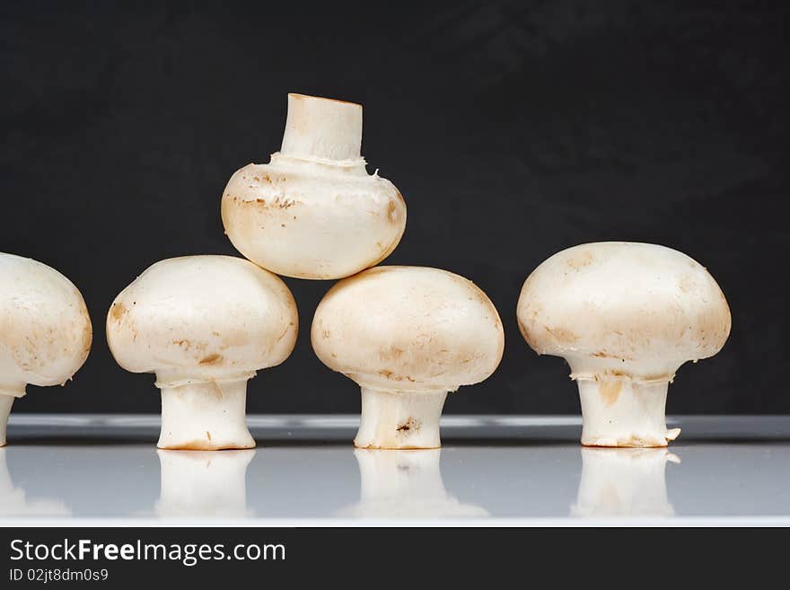 Fresh mushrooms on a white table