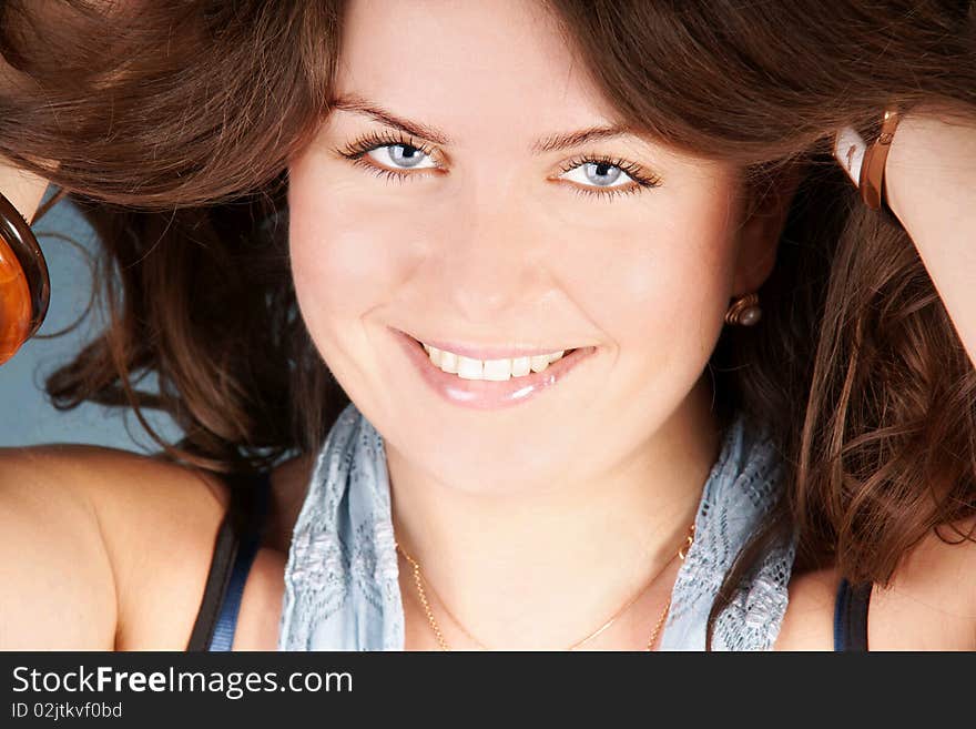 Portrait of beautiful happy smiling young woman, studio shot. Portrait of beautiful happy smiling young woman, studio shot