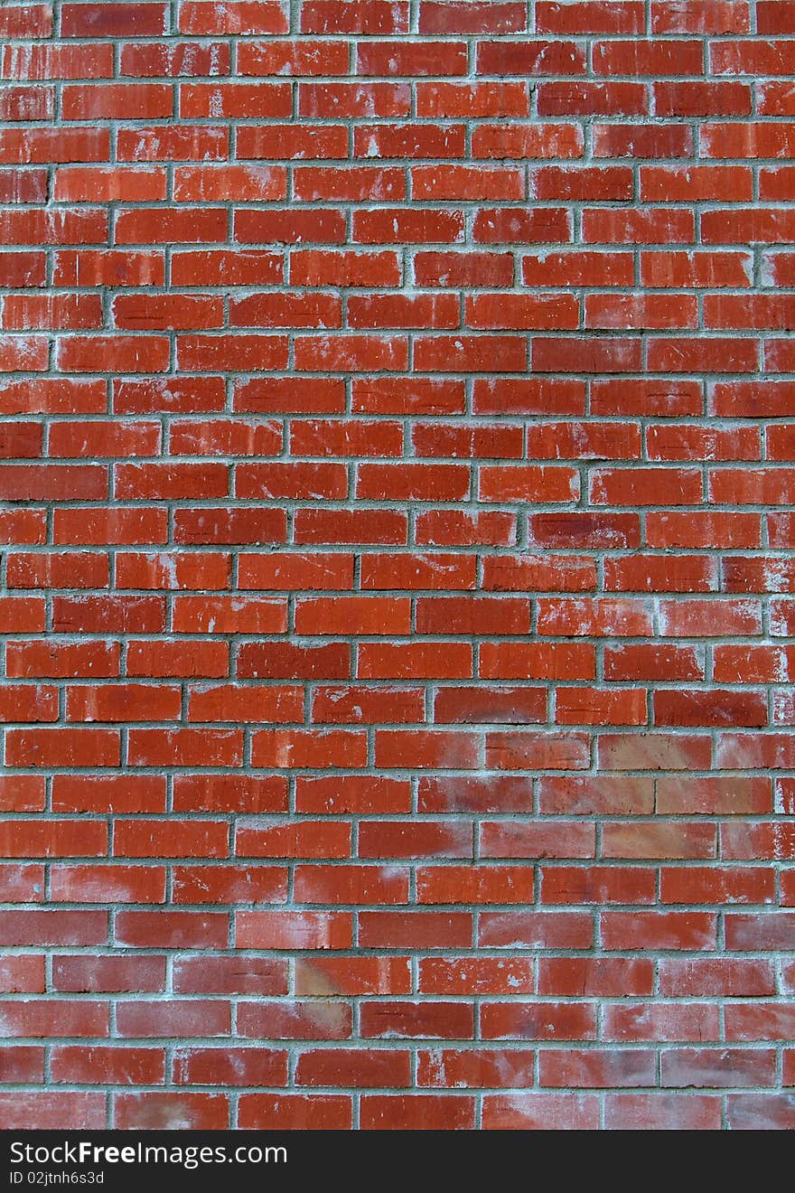 Red brick wall with white washed areas. Red brick wall with white washed areas