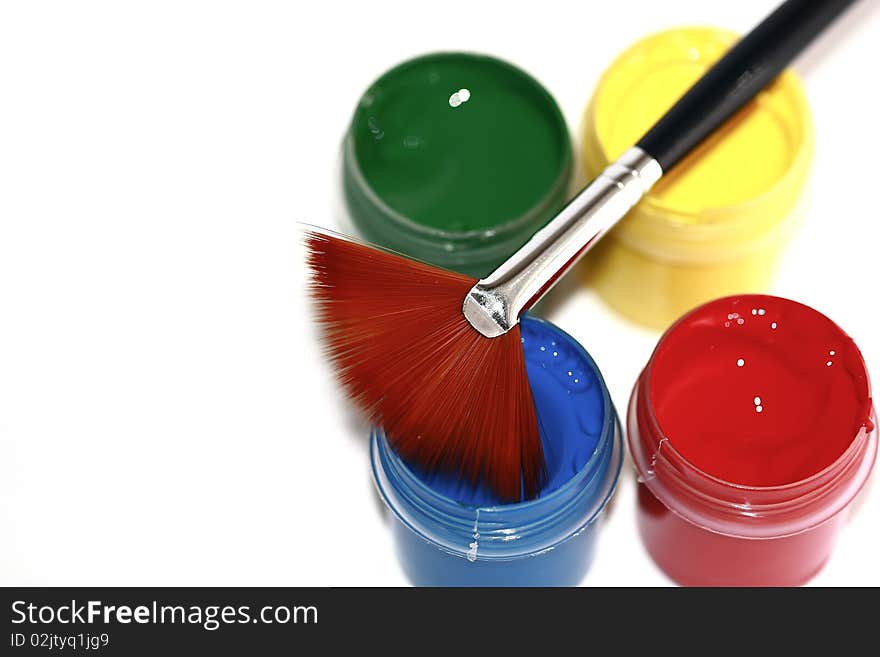 Pain brush with color paint buckets on white background. Pain brush with color paint buckets on white background