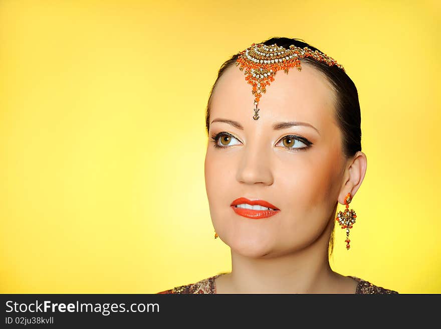 Young Beautiful Woman In Indian Traditional Makeup